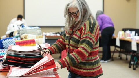 Stephanie Bowen, a Common Ground employee, helps seperate bags to be filled for older adults in nursing homes to let them know they are not forgotten. For the past three years, SACE senior volunteers have assembled and delivered “Not Forgotten” bags to residents in some of the community’s most under-resourced nursing homes. This year, students from the Rochester City School District’s Restorative H.U.B.—a program designed to support student and family needs both in and out of school—volunteered alongside them to help assemble the bags. As need continues to grow, volunteers aim to distribute 250 bags this year, up from 175 last year. The bags include new, essential items that many seniors living on Medicaid often cannot afford, such as T-shirts, socks, and personal-care supplies.