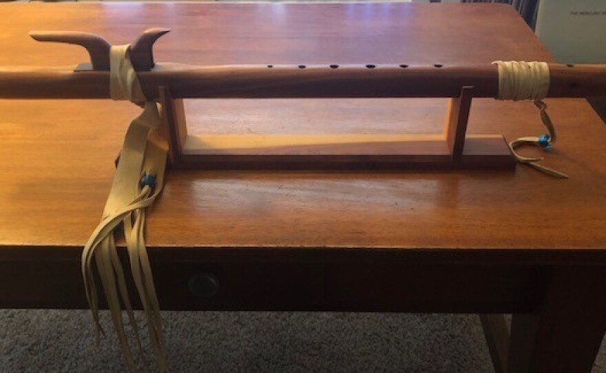 To remember his mother, Adam Waugh sometimes plays his mom's Lakota flute.