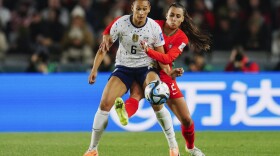 United States' Lynn Williams, left, and Portugal's Catarina Amado battle for the ball during the Women's World Cup Group E soccer match between Portugal and the United States at Eden Park in Auckland, New Zealand, Tuesday, Aug. 1, 2023. (AP Photo/Abbie Parr)