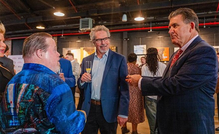 Rick Sebastian, President and CEO of the Kennedy Collective (on the right)