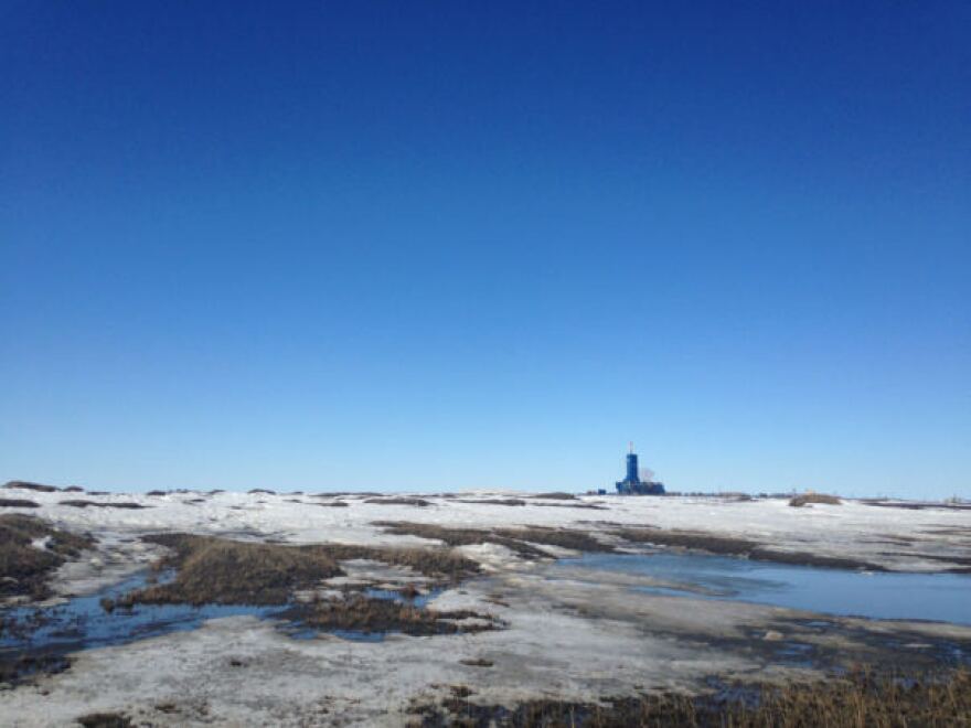 An oil rig contracting for BP looms on the horizon at Prudhoe Bay this spring. (Photo by Elizabeth Harball, Alaska’s Energy Desk)