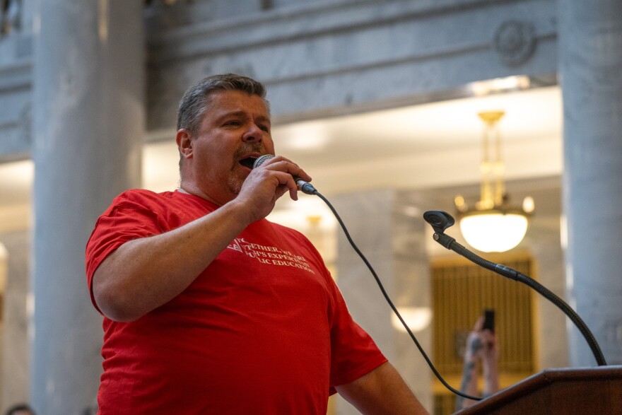 Salt Lake Education Association union president and Salt Lake City School District employee Mike Harman led the crowd in chants for a half-hour before speakers addressed the crowd. The chants focused on calling Gov. Spencer Cox to veto HB267 and also the power of unions. He also led the crowd in singing “Solidarity forever! Solidarity forever! Solidarity forever! For the union makes us strong.”