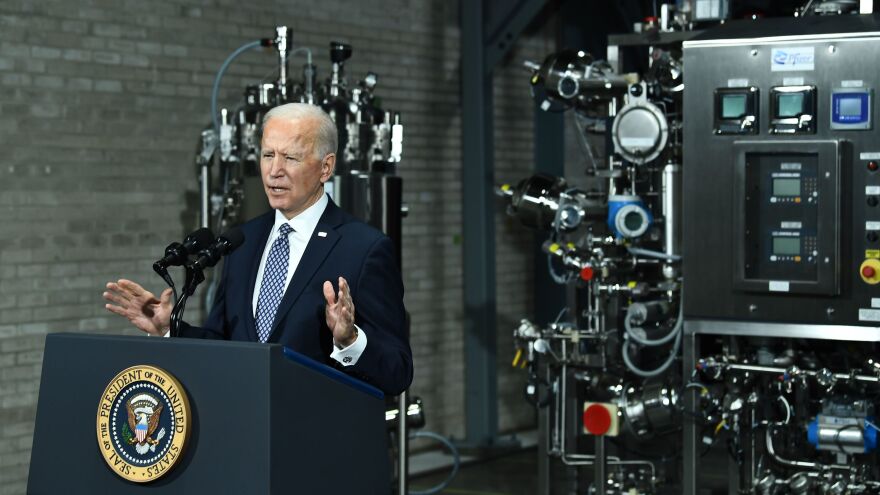 President Biden speaks Friday at a Pfizer COVID-19 vaccine manufacturing site in Portage, Mich. The House could pass a version of his $1.9 trillion COVID-19 relief legislation this week.