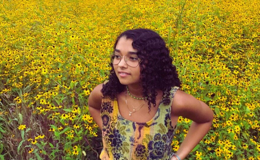 Chloe R. stands in a field of sunflowers on the cover of her single "Summer Love"