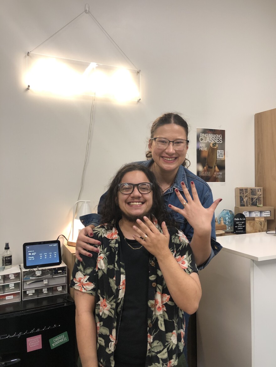 Dae Iddings and Jaden Ziv showing off their wedding bands