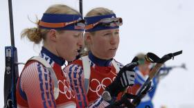 Lanny and Tracy Barnes at a practice session for the women's 75-kilometer biathlon sprint during the 2006 Winter Olympics in Turin, Italy.