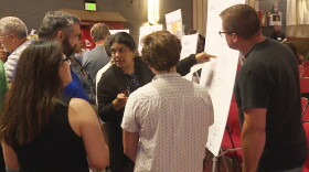EPA toxicologist Bhooma Sundar talks with concerned Franklin residents about contamination from the Amphenol site.