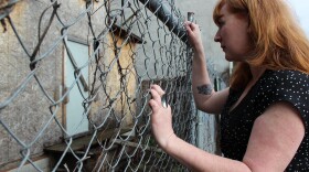 Michael Stephens, founder of the Macefield Music Festival, looks at Edith Macefield's house on a recent afternoon. The house is now owned by the bank and could be put on the open market.