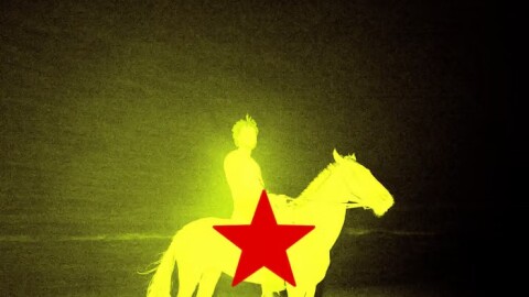 a yellow image of a man on a horse with a red star 