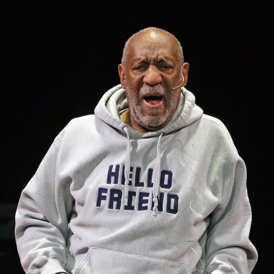 Comedian Bill Cosby performs at the Buell Theater in Denver, in January. Cosby, 77, is facing sexual assault accusations from more than two women, with some of the claims dating back decades.