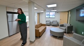 Victoria Toomey, outreach coordinator for CCR, gives a tour of the common area.