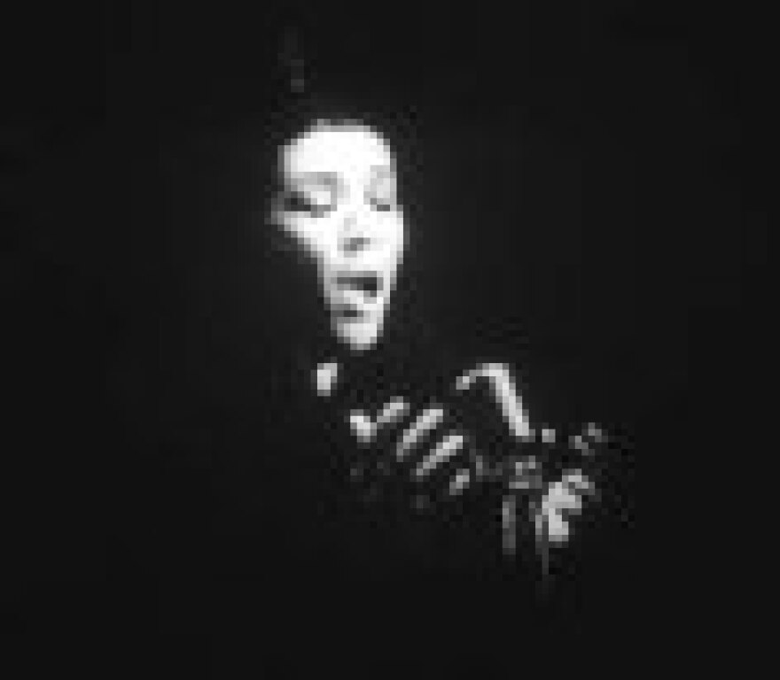 Shirin Neshat, Turbulent, 1998. Video projection and laser discs. Dimensions variable. Collection Museum of Contemporary Art, Chicago, gift of Susan and Lewis Manilow. Photo Museum of Contemporary Art, Chicago. Photos by James Isberner.