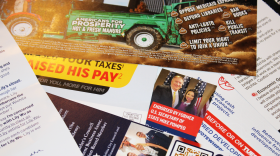 A stack of campaign mailers. 