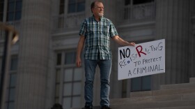 Jeff Clouse, of Columbia, Mo., 54, protests the legislature's efforts to redraw congressional maps to favor the GOP on Wednesday, Sept. 10, 2025, at the state Capitol in Jefferson City.