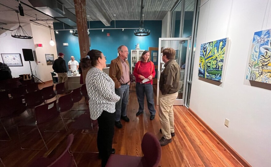 Development Director Mary Bradley and Station Manager Kevin Crane talk with guests.