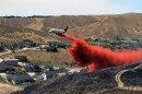 A large air tanker dropped retardant on the ground in the Boise Foothills to help stop the spread of the 2015 Eyrie Fire in southern Idaho.