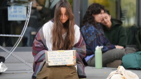 Student Isabel Breslin works on her laptop during a sit-in protest at Cornell University, Wednesday, Oct. 7, 2026, in Ithaca, N.Y.