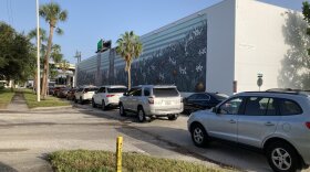 Cars lined up at drive-thru testing site at Tropicana Field.