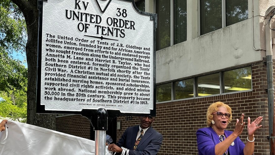 Lodies Gloston, president of the United Order of Tents, unveils the group’s new historical marker in Norfolk on June 29. (Photo by Ryan Murphy)