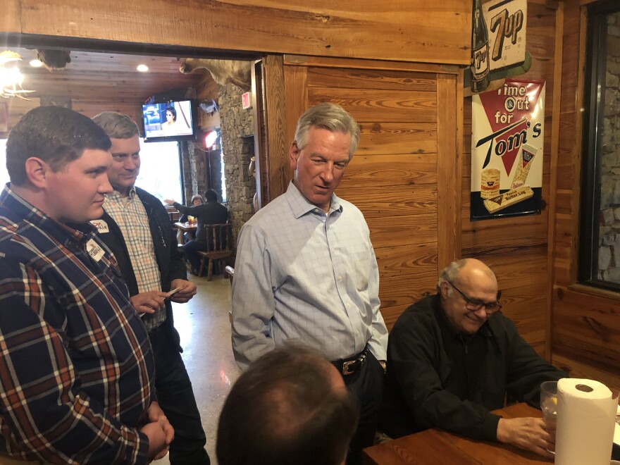Former Auburn Coach Tommy Tuberville courts voters at Big B Barbecue in Alexander City, Ala.