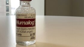 This Wednesday, March 1, 2023 photo shows a vial of Eli Lilly's Humalog insulin in New York. Eli Lilly will cut prices for some older insulins later this year and immediately give more patients access to a cap on costs they pay to fill prescriptions. The moves announced March 1, 2023 promise critical relief to some people with diabetes who can face annual costs of more than $1,000 for insulin they need in order to live. Lilly’s changes also come as lawmakers and patient advocates pressure drugmakers to do something about soaring prices. (AP Photo/Pablo Salinas)