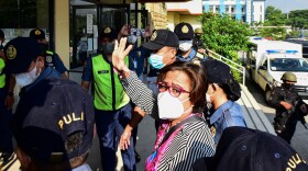 Former Philippine Senator and human rights campaigner Leila de Lima, a high-profile critic of former President Rodrigo Duterte and his deadly drug war, arrives at her hearing on illegal drug charges at the Muntinlupa Trial Court in Manila on Aug. 26.
