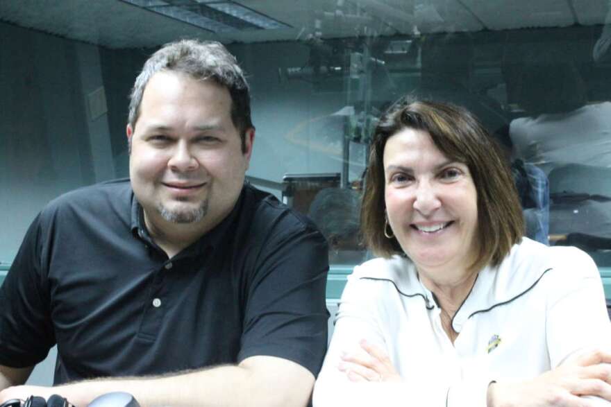 Father Jose Rodriguez &amp; Professor Deborah Biedel. Photo: Matthew Peddie, WMFE