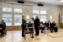 Northampton City Clerk Pamela Powers swears Mayor Gina-Louise Sciarra in for her second term in office on Monday at the Northampton Senior Center.