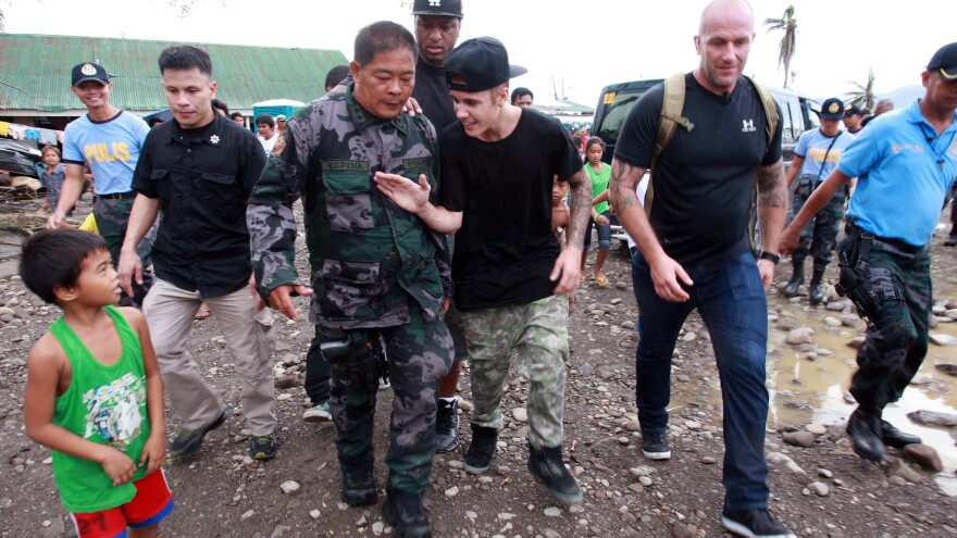 Justin Bieber may have a bad boy side, but the angelic Bieber launched a campaign to raise money for victims of Typhoon Haiyan, which struck the Philippines last year. Here, he visits a Filipino elementary school. And he took the Ice Bucket Challenge — twice. And urged Beliebers to do the same.