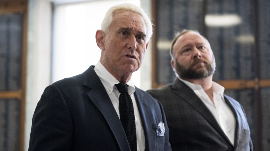 Roger Stone, left, and Alex Jones hold a press conference before attending a House Judiciary Committee hearing in 2018.