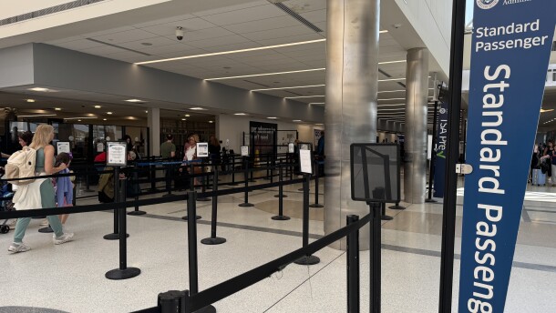 Dayton's TSA agents have been showing up to work to keep lines moving at Dayton International Airport, despite missing two and a half paychecks.