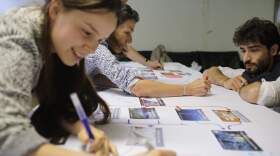 Participants learn about climate change causes and outcomes at Climate Fresk. (Courtesy of Sheila Suarez de Flores)
