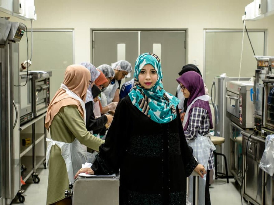 "In college, I would tell my friends that I wanted to pursue a Ph.D., and they would chuckle and ridicule the idea," says Eqbal Dauqan, who is an assistant professor at the University Kebangsaan Malaysia at age 36. Born and raised in Yemen, Dauqan credits her "naughty" spirit for her success in a male-dominated culture. (Sanjit Das for NPR)