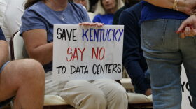 Many of the attendees at the Mercer County Fiscal Court meeting brought signs expressing opposition to data centers.