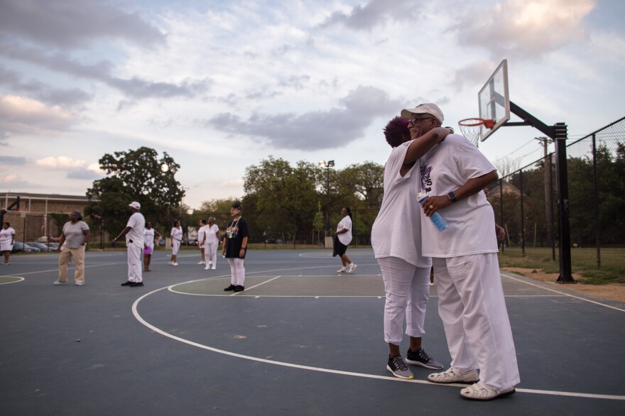 Daryl Watson (right), a pastor at a Baptist church, says dancing keeps him in shape and helps him unwind. The Line Dance Addicts refer to him as "the Reverend"; his other nickname is "Smooth Operator."