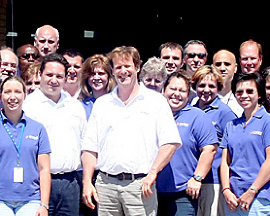 Some of the staff of Proton OnSite with CEO and President Robert J. Friedland in Wallingford.