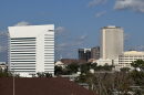 The Turlington Building, which houses the Florida Department of Education, stands in the foreground, with the Tallahassee skyline, including the Capitol building, beyond. Photo taken from the FAMU campus on Dec. 31, 2024.