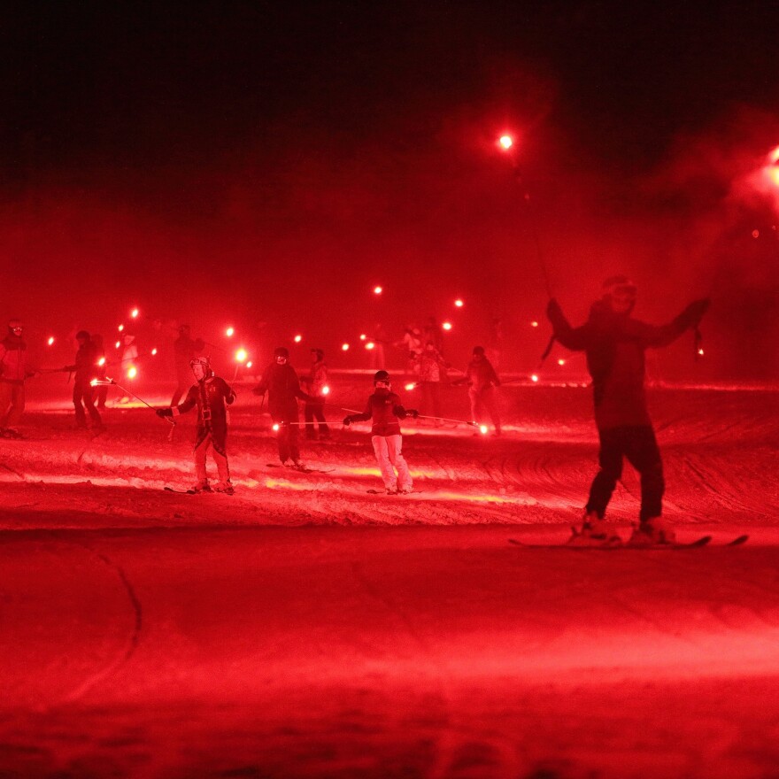 Park City Mountain lights up with annual Christmas Eve torchlight parade