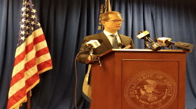 U.S. Attorney Ben Glassman announces the suit at a Thursday afternoon press conference.