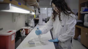 A public health scientist in the Newborn Screening Lab.