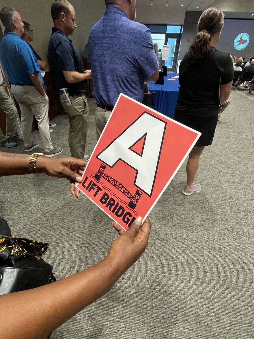 Residents of New Hanover and Brunswick counties spoke up against some of the many aspects of the replacement of the Cape Fear Memorial Bridge that would drastically change their quality of life. NCDOT has two current design options up for consideration: Alternative A, a moveable segment bridge that would raise to 135 feet to allow for waterway clearance, would be similar in footprint, placement and function to the current bridge. Alternative B, a 135-ft fixed-span bridge, would be taller and longer, posing a greater impact on the environment. Many attendees waved red signs with a giant A on it at the Wilmington hearing, representing their support for Alternative A.