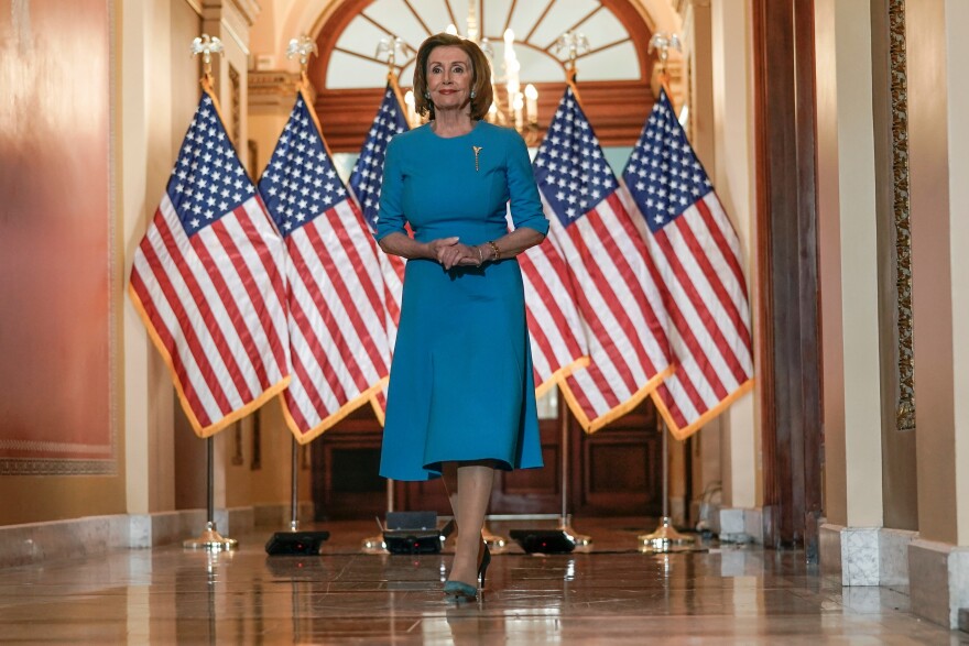 House Speaker Nancy Pelosi of Calif., arrives to speak about the House coronavirus bill on Capitol Hill in Washington, March, 13, 2020.