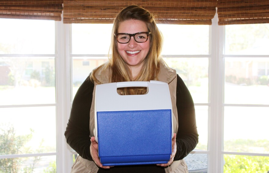 Melissa Mathis holding the cooler she used to smuggle her placenta out of the hospital.