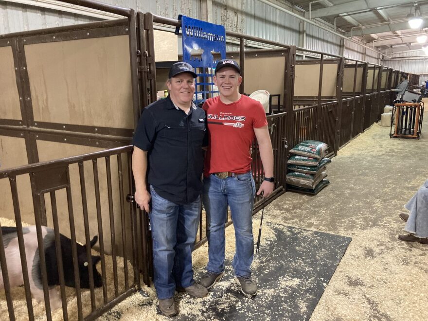 Nash Williamson (right) and his father Jamie Williamson pose for a picture at the Oklahoma Youth Expo in Oklahoma City.