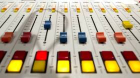 A 2014 file photo shows an audio mixing board at the KCUR studios.