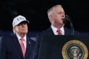President Donald Trump listens as North Carolina U.S. Senate candidate Michael Whatley speaks at a campaign rally at Pitt–Greenville Airport, Tuesday, Oct. 20, 2026, in Greenville, N.C.