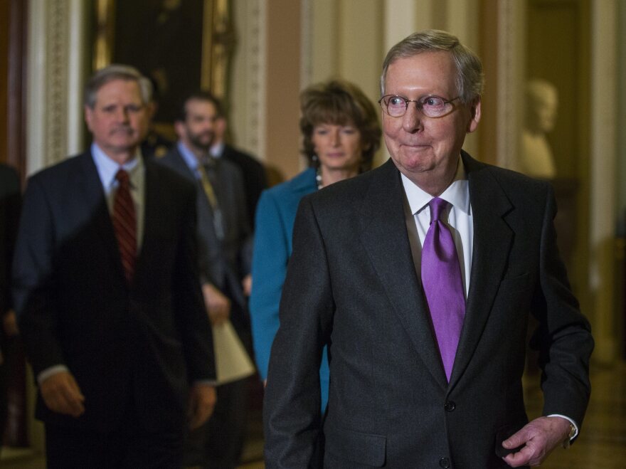 Senate Majority Leader Mitch McConnell, R-Ky., prepares to speak to the media Thursday before the Senate voted to approve the Keystone XL pipeline.