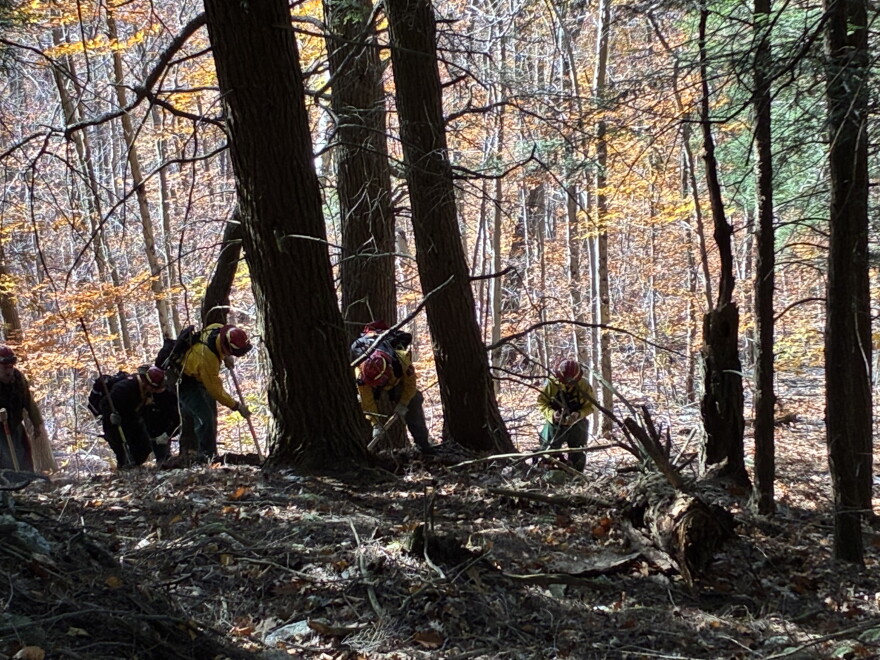 Fire crews are continuing to put out the fire Wednesday after completely containing it Tuesday night.