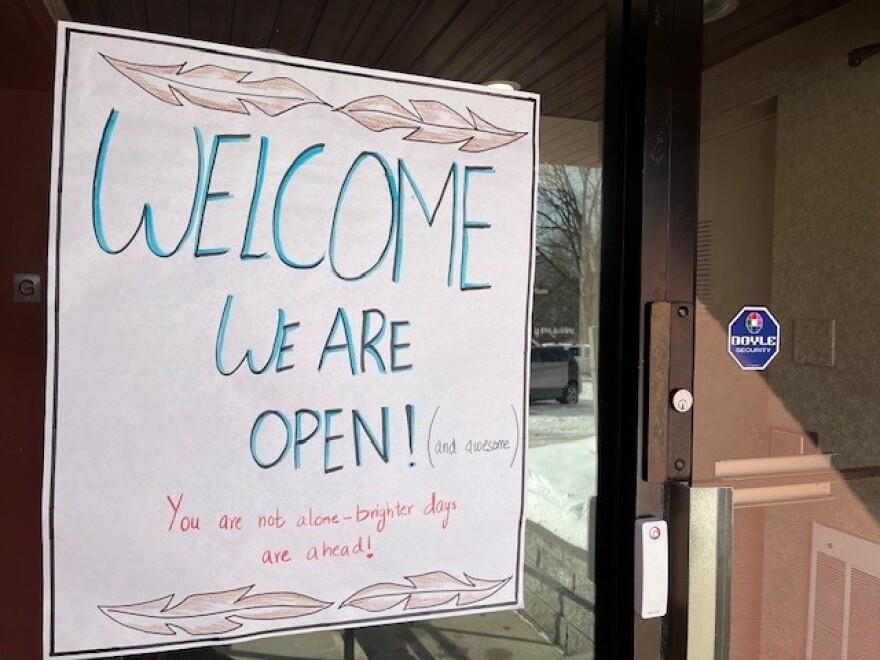 A sign at the entrance to Interfaith Works offers words of encouragement to refugees and others who feel targeted by the Trump administration.