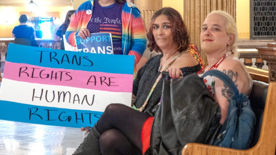 Wichita residents Rhashanna Grant, left, and Christine Lebeau participate in the Feb. 6, 2026, "pee-in" rally at the Kansas Statehouse to oppose legislation that restricts access to bathrooms in public buildings and invalidated driver's licenses.